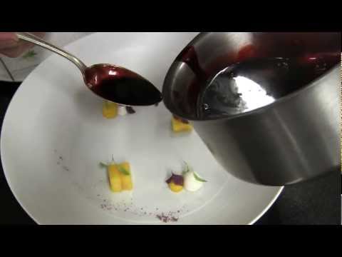 Amador prepares one of his signature dishes at his 3 Michelin restaurant
