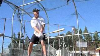 Cardinals hitting coach Mark McGwire takes BP