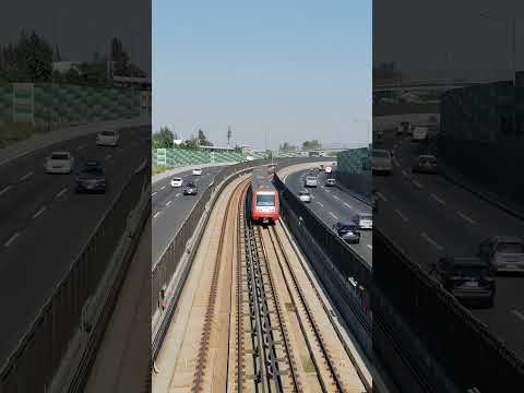 Metro de Santiago Línea 4A (AS02) próximo a ingresar a Estación La Granja