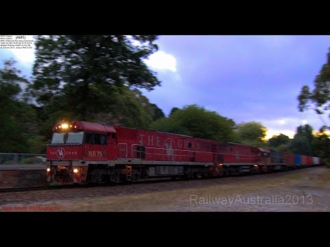 NR75(GH), NR74(GH) and NR63(V) lead AM5 through Aldgate.