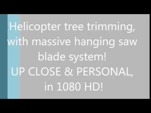 Helicopter, with air saw trimming trees, up close and personal in 1080 HD