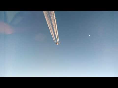 Airbus A380 with contrails