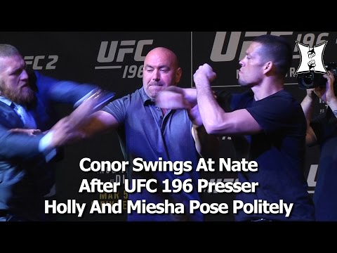 Conor McGregor Punches Nate Diaz; 209 Scuffle Follows At UFC 196 Face-Off (HD)