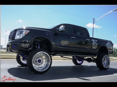 LIFTED NISSAN TITAN CUMMINS 26x14 Specialtys on a 12 inch Bulletproof lift