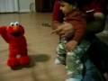 Sanat Encounters Tickle Me Elmo