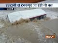 Bus washed away by swollen river in Uttarakhand