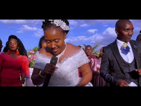 FAITH NZILANI SURPRISES HER HUSBAND WITH A LOVE SONG ON THEIR WEDDING  (KINDU KISEO)Official video.