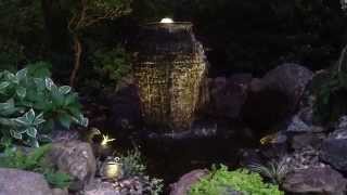 preview picture of video 'Large slate stacked urn at night'