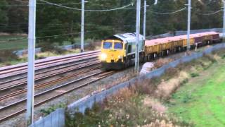 preview picture of video 'Winwick Junction 20.10.2014 - Freightliner engineers trains to Culgaith - Class 66 70'