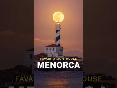Full Moon rising at the top of Favàritx Lighthouse, in Menorca island
