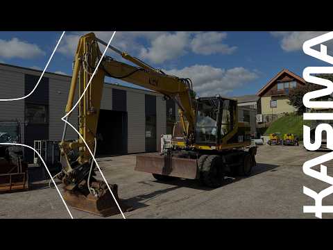 Caterpillar M 312, excavator