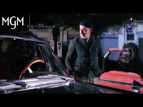 Thumbnail of the video: THE PINK PANTHER (1964) | Costumed Car Chase | MGM