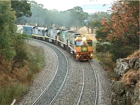 Multi liveried Australian NR class locomotives - 7SP5 freight - Exeter - November 2002
