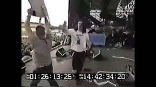 Gibby from the butthole surfers shoots blanks from a shotgun over Lollapalooza