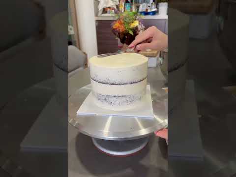 The secret to smoothing out buttercream cakes! Cake scraper, light pressure and practice!