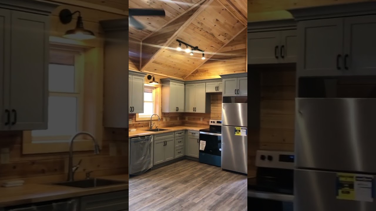 New 512 sq ft log cabin with giant 650 sq ft 'treehouse' deck and kitchen