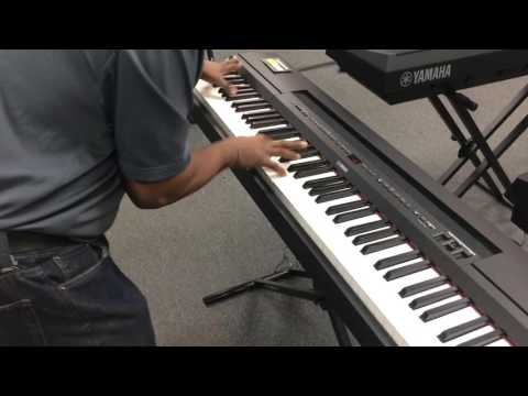 Kris Nicholson Kris Nicholson Test Driving a Yamaha P-255 Digital Piano  at Sam Ash