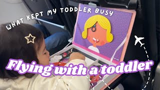 Toys and activities that worked (and didn't work) on our first flight with a 2-year-old