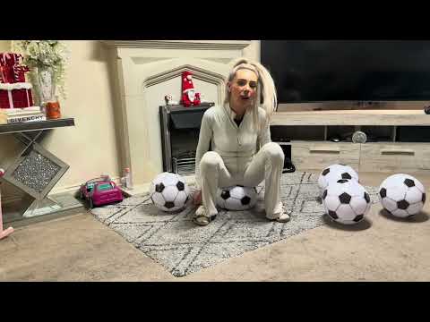 Inflatable beach ball popping 