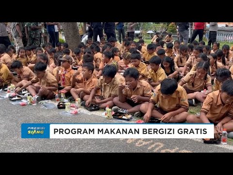 POLRES GIANYAR DISTRIBUSIKAN MAKANAN BERGIZI DI SD N 2 PUPUAN TEGALLALANG