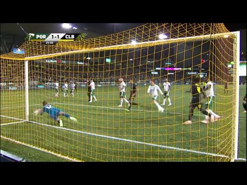 SAVE: Steve Clark dives to bat away a Pedro Santos free kick