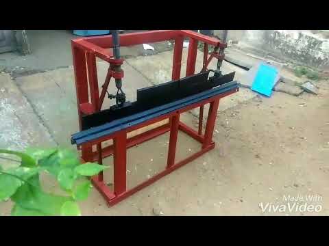 Metal sheet bending machine