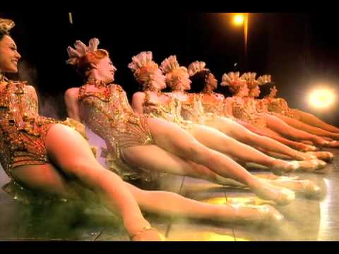 Commercial still — chorus girls and deco fonts that the OBCR turns into big-band sparkle