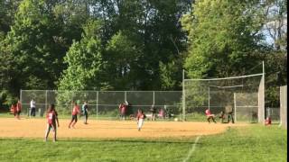 Hit with a spin gets young softball player to 1st base