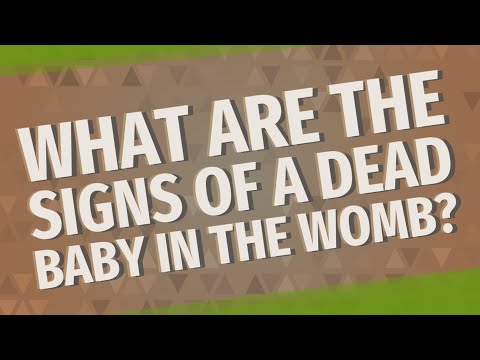 What are the signs of a dead baby in the womb?