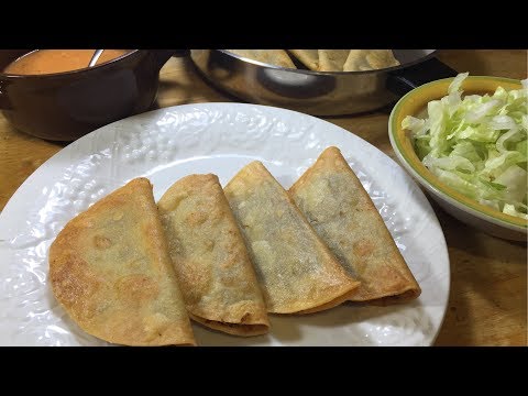 Tacos Dorados de Carne Deshebrada con Papas
