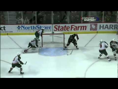 Niklas Backstrom desperation diving stick save on Brouwer - Blackhawks CSN Feed