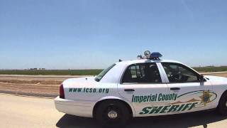 preview picture of video 'Imperial County Sheriff passes on Interstate 8 Freeway, El Centro, CA, 31 May 2013, GOPR0008'