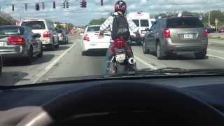 WORLDS BEST Motorcycle Popping Locking and Dropping it, at a Stop light