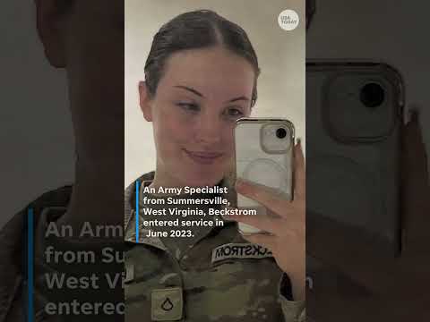 Mourners hold candlelight vigil in slain National Guardsman's hometown