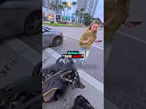 Biker Hits Car's Door 😱