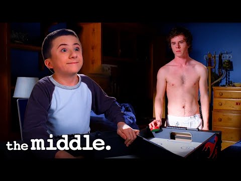 Brick Hustles Axl in Air Hockey | The Middle