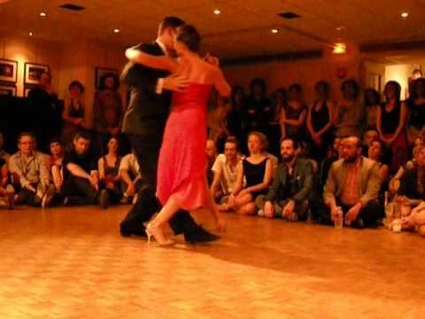  Barbara Carpino  and  Claudio Forte  are  dancing  to  a  tango