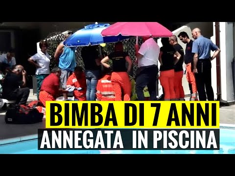BIMBA DI 7 ANNI ANNEGA IN PISCINA INCASTRATA SOTTO UN GONFIABILE: TRAGEDIA A ROZZANO