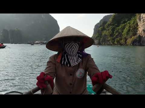 Row boat through Ha Long Bay