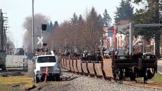 preview picture of video 'UP 8357 leads a baretable train through Woodburn, Oregon 3-8-2012... Bonus Amtrak Cascades!!!'