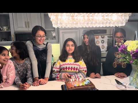 Rayya cutting the cake 12th birthday at home 