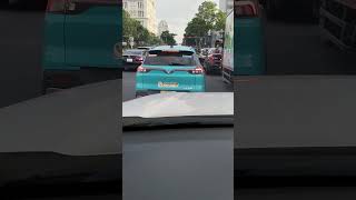 Beautiful Vietnam: A Vinfast electric car carrying passengers,called green taxi -protect environment 