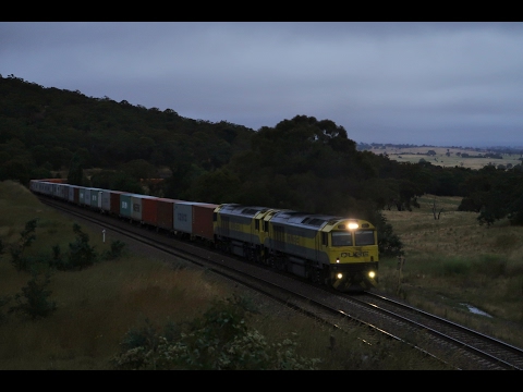 QBX005+QBX004 climb the grade at Cullerin, NSW hauling #3112 Junee-Sydney Qube container service