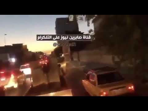 grupo de militantes de hezbolla celebran cerca de la zona verde en Bagdad , Irak