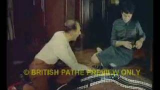 Stirling Moss at home with his Scalextric