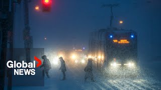 Flights, schools cancelled in Toronto as "historic" snowstorm wallops Ontario