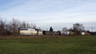 preview picture of video 'DM&E 4004 near the Rockford Intl Airport - Camp Grant - 11/22/2013'