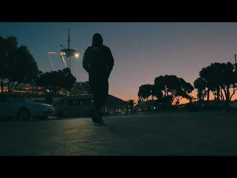 Man walking in street and sunset - Copyright Free Video