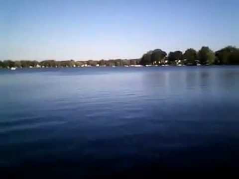 On the Lake   Man In paddle  boat  fishing