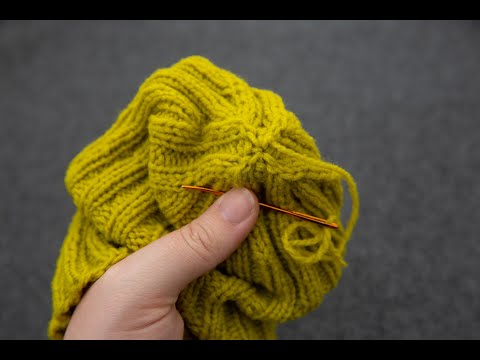 Closing the top of a knit hat